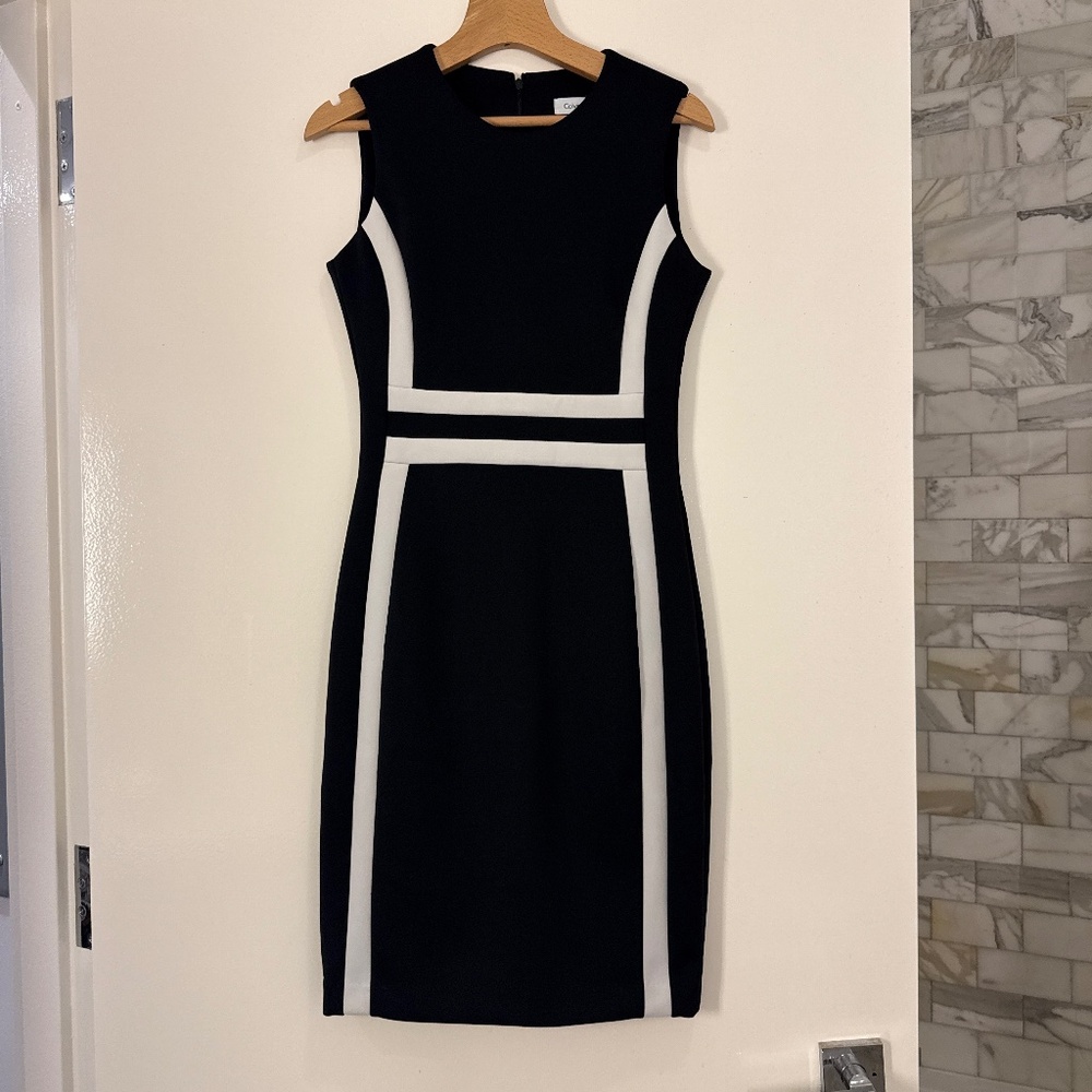 Sleeveless black midi with white detail